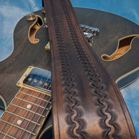 Dark Sunrise Tooled Leather Guitar Strap
